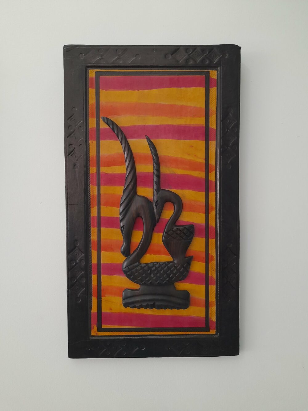 Tableau silhouette antilope sur fond orange-rouge